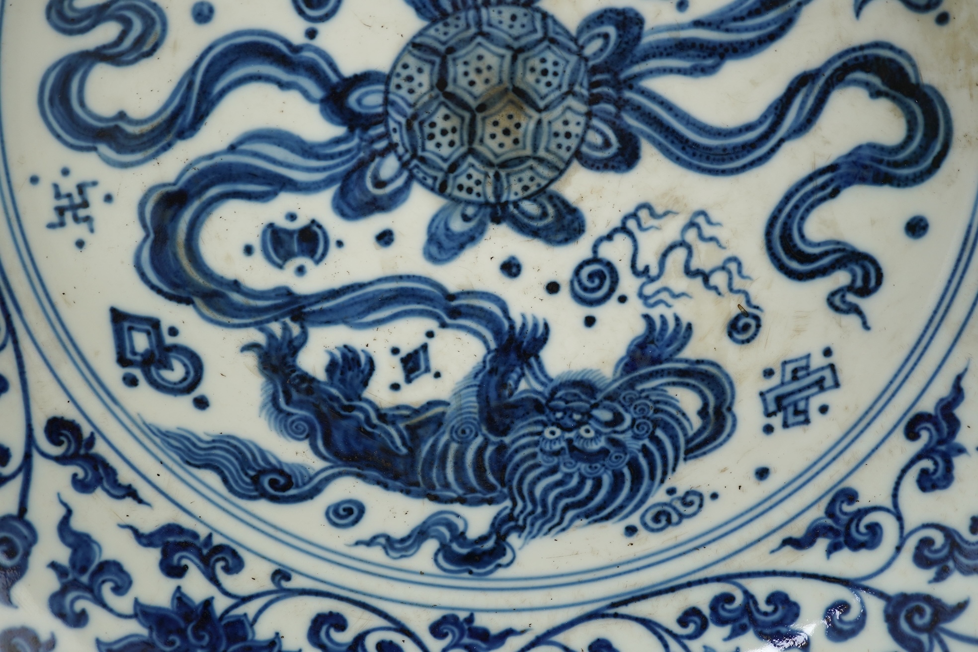 A Chinese blue and white 'Buddhist lions' dish, Ming Dynasty or later
